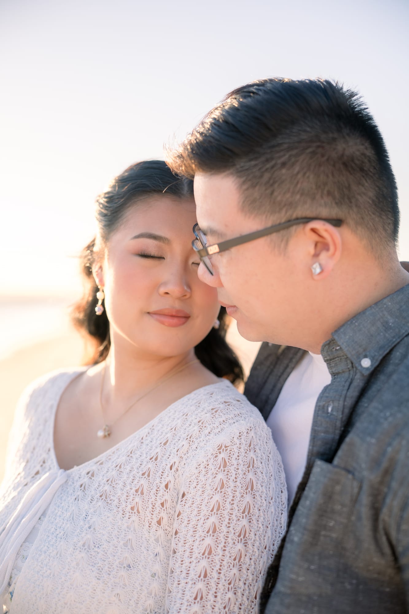 Christine and Thomas together in golden evening light.